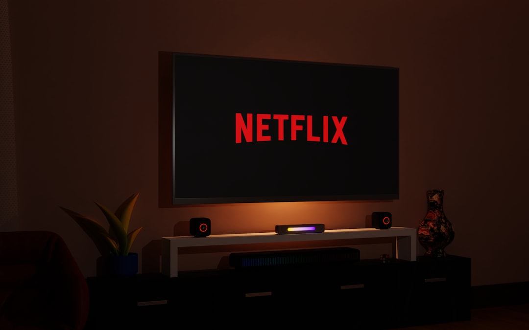 television, Netflix, Netflix logo, room, living room, entertainment, screen, technology, home, decoration, design, interior, space, relaxation, leisure, rest, streaming, streaming services, TV, flat screen, electronics, electronic devices, gadgets, tech gadgets, electronic gadgets, entertainment gadgets, home gadgets, tech gadgets, streaming gadgets, Netflix gadgets.