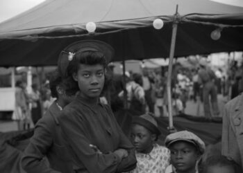 Caption reads, "At the Greene County fair, Greensboro, Georgia." Original black and white nitrate negative by Jack Delano. Taken October 1941, Greene County, Georgia, United States (@libraryofcongress). Remastered by Jordan J. Lloyd (@unseenhistories). The original scan can be found at the Library of Congress ⇲ https://www.loc.gov/item/2017750929/ – See it on Unseen Histories at ⇲ https://www.unseenhistories.com/greene-county-fair-1941