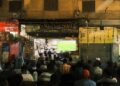 watching football match on the streets of Cairo