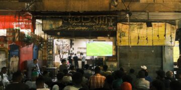 watching football match on the streets of Cairo