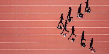 Working on a project for my school’s track team on a summer morning. I noticed the sun was perfectly angled to expand the shadows of the runners into full size. I launched my Mavic Pro to 300 ft. and made them run in arrow shape. Which I was able to capture this interesting overhead shot of them running and their shadows be an identical profile shot of them.