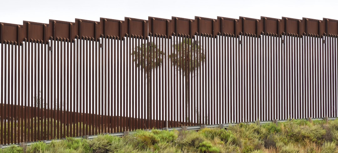The Mexican-American border wall near the Pacific Ocean in San Diego, California.