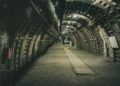 Step into history with this underground coal mine corridor, a place of resilience and hard work. Shadows and textures tell stories of miners' lives, deep beneath the earth's surface.